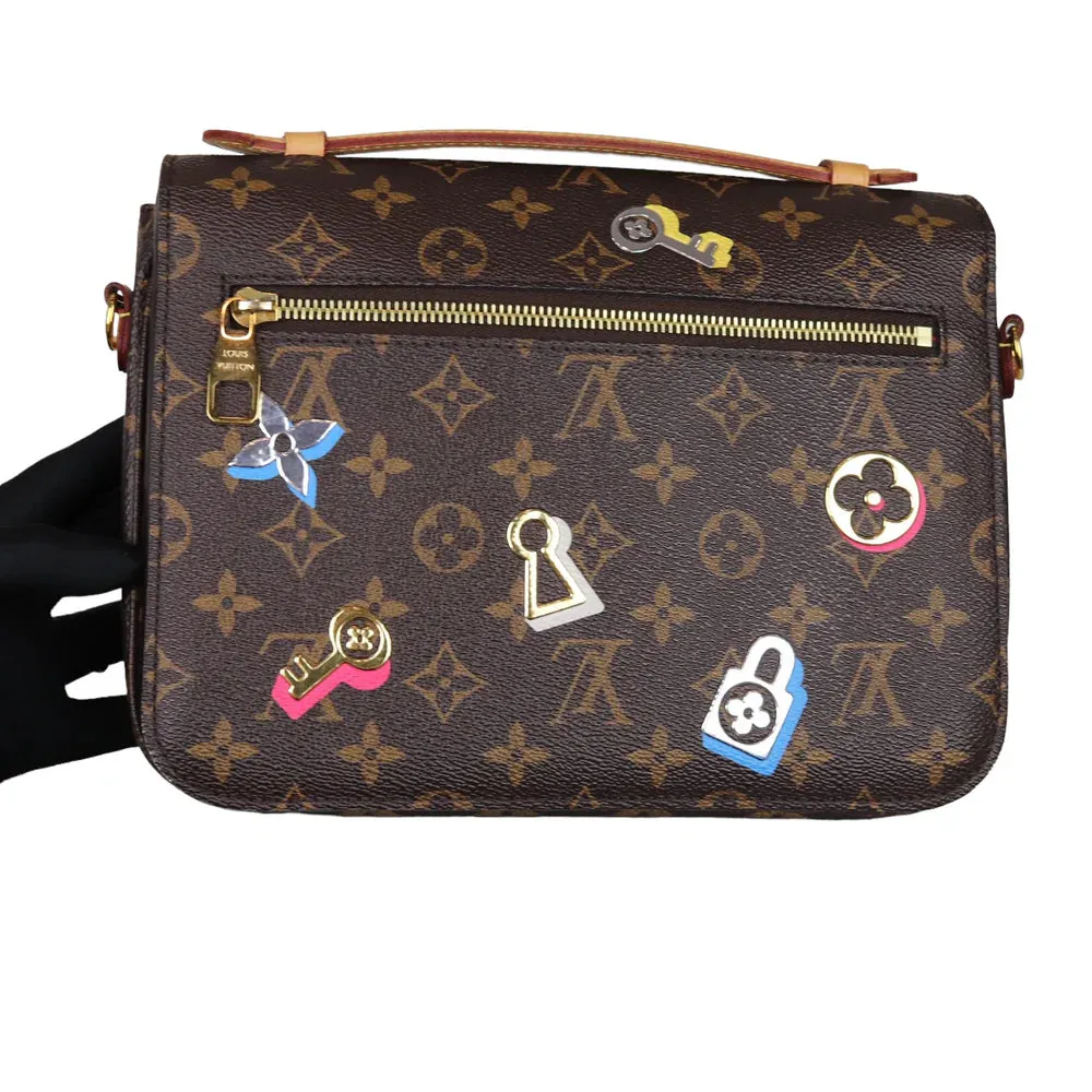 Pochette Metis Monogram Love Lock GHW